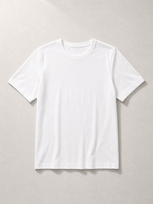 UOMO VIANA Essential White Tee on a pale stone background