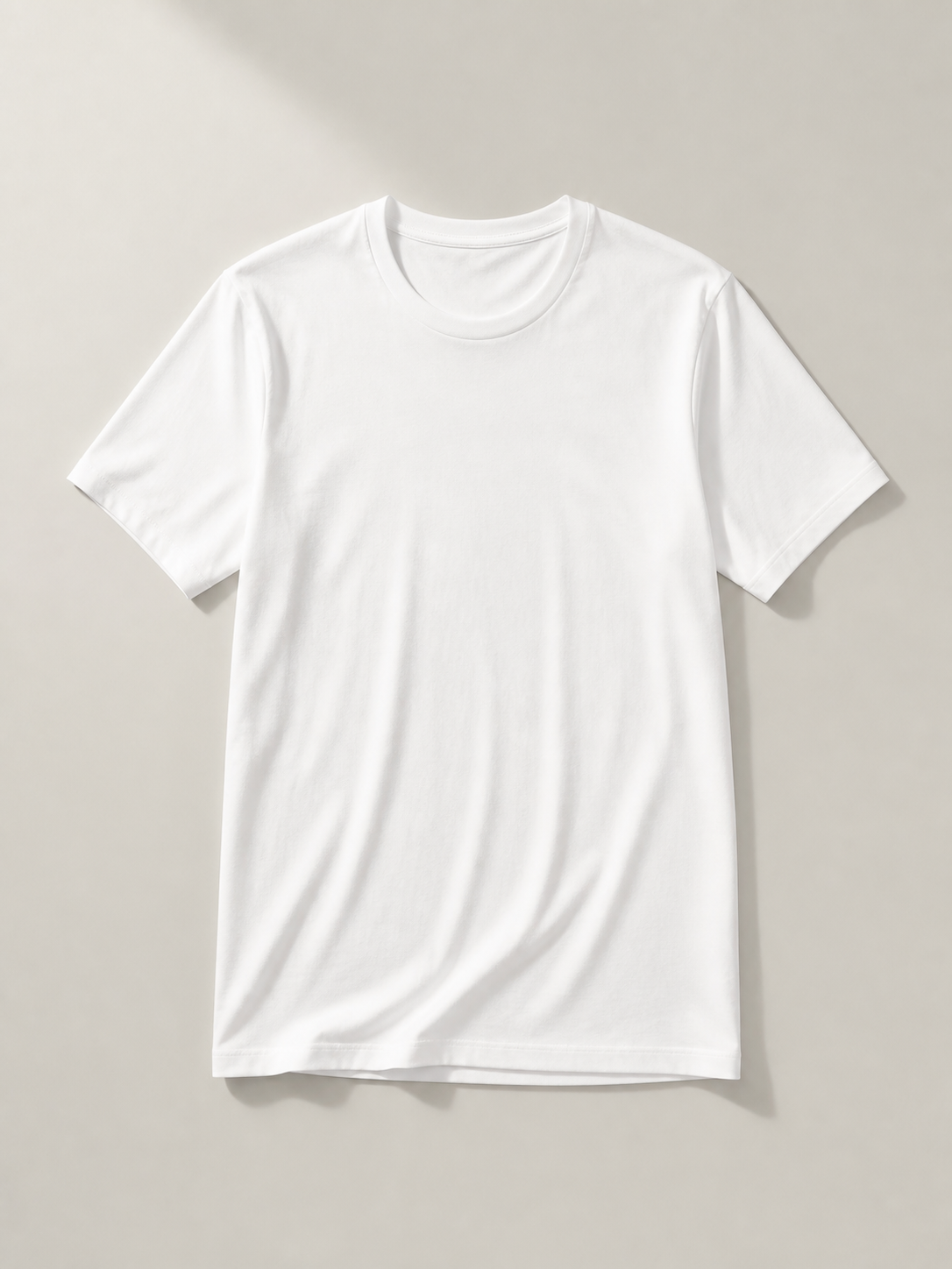 UOMO VIANA Fine White Tee on a pale stone background