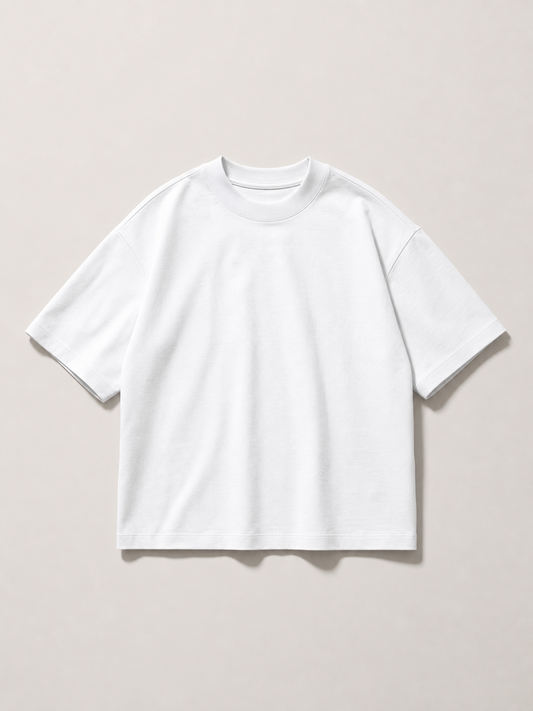 UOMO VIANA Heavyweight White Tee on a pale stone background