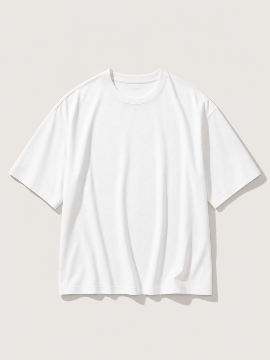 UOMO VIANA Relaxed White Tee on a pale stone background