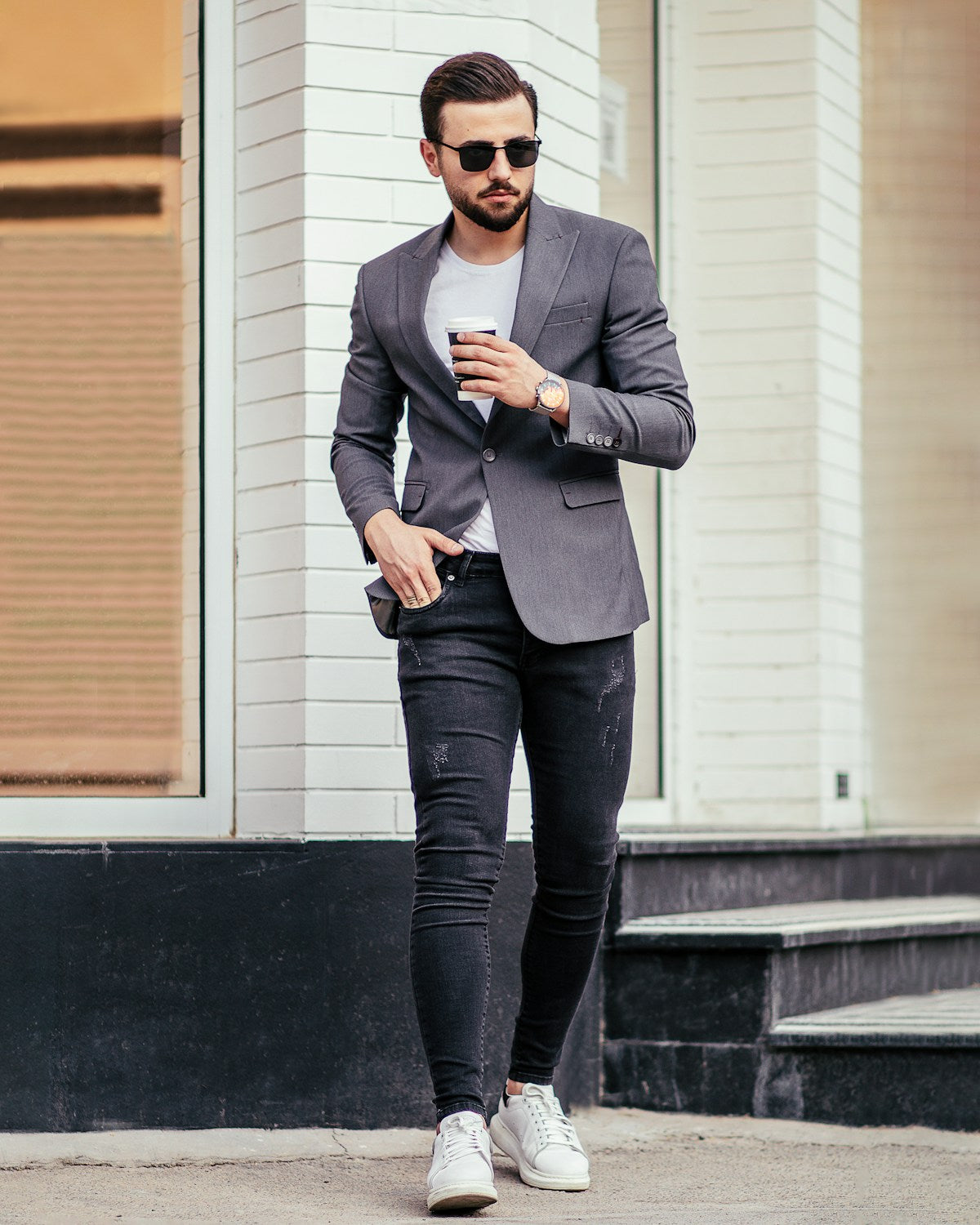 Grey tailored blazer with black trousers